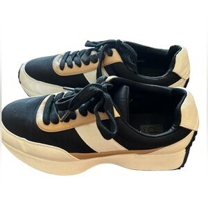 Chic Black and Cream Sneakers   DV by Dolce Vita